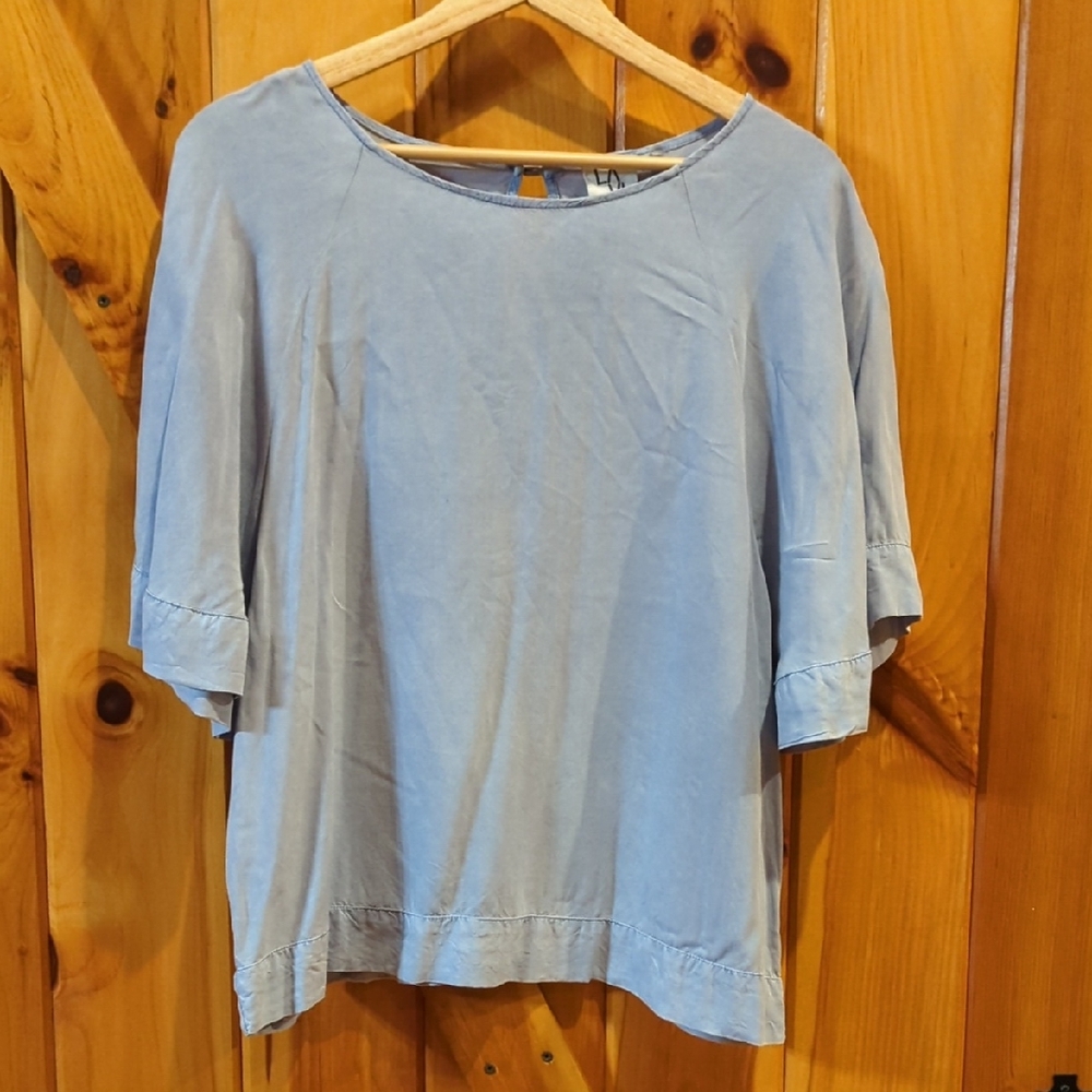 Blue flutter sleeve blouse